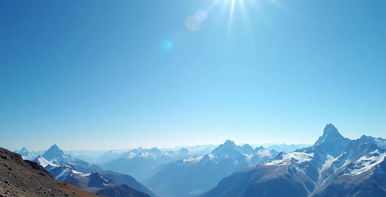 Paysage montagneux photographié au grand angle montrant la variation de saturation du ciel bleu